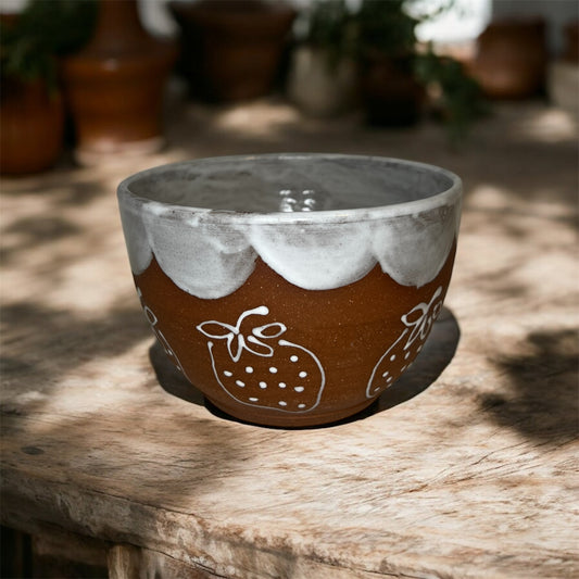 Strawberry bowl with white outline strawberries and inside white glaze with outside swoop white glaze